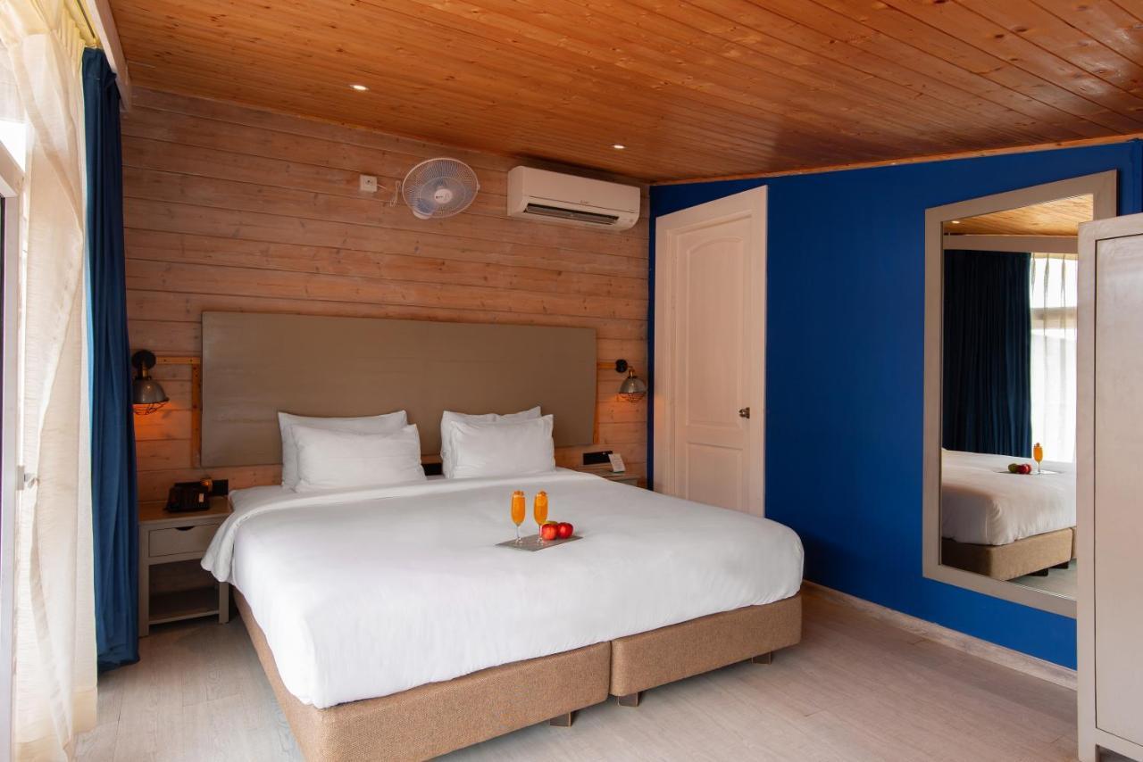 Living Room Beach Resort Morjim Exterior foto
